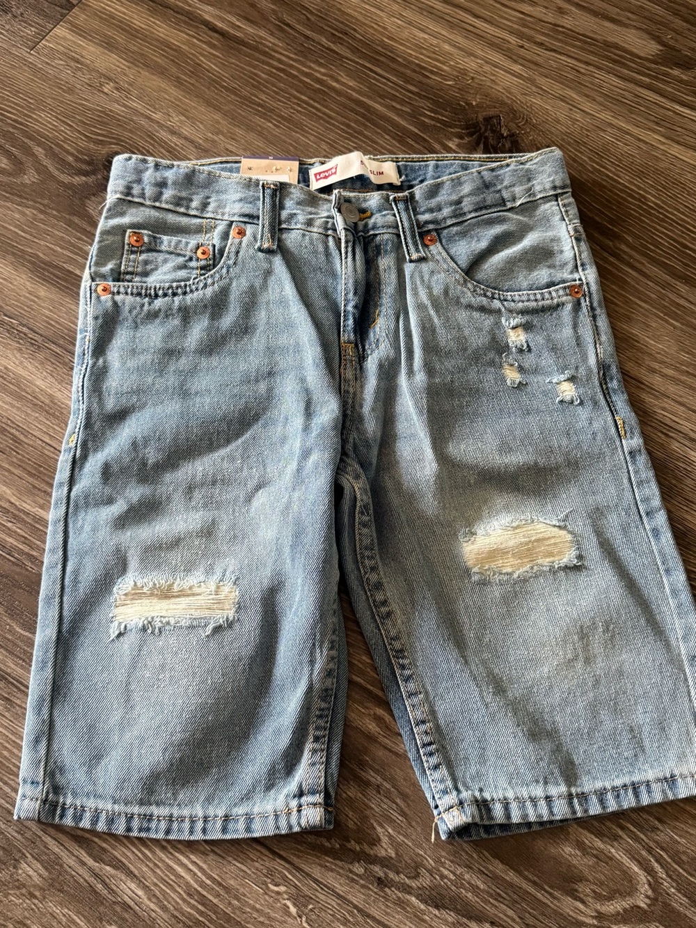 Levi's Light Blue Distressed Denim Bermuda Shorts